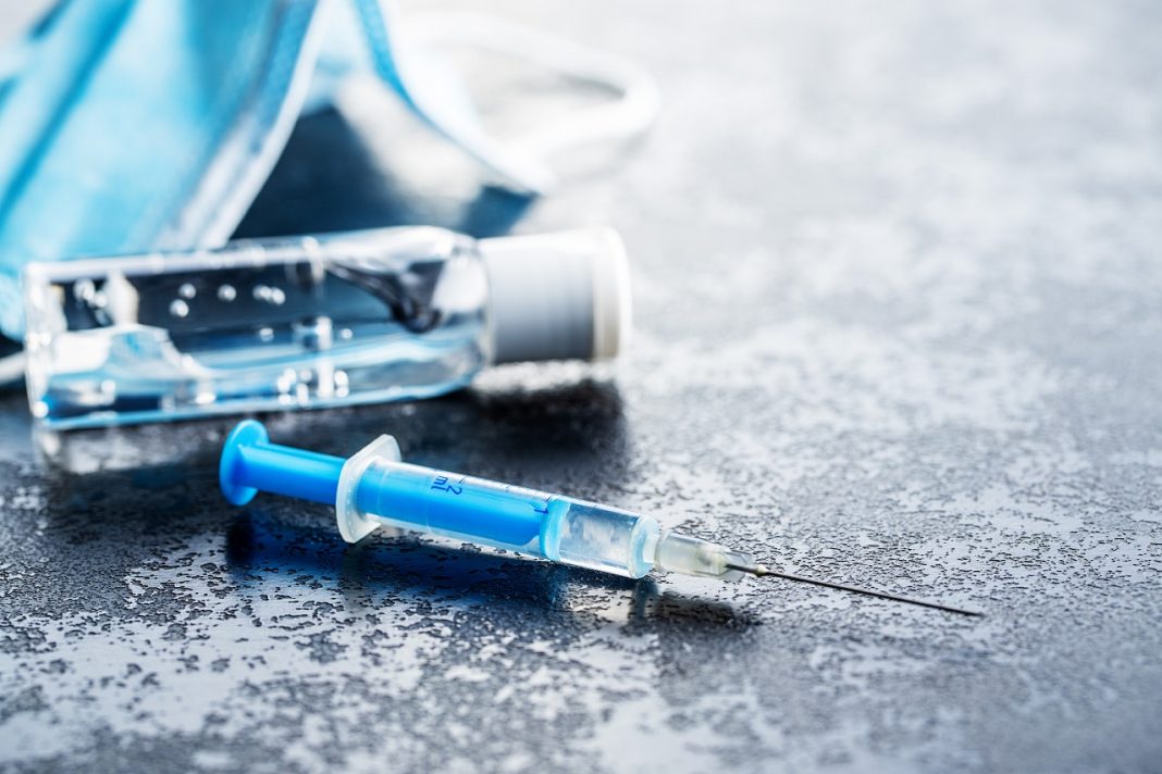 Injection syringe. Covid-19 coronavirus vaccination. Corona virus vaccine.