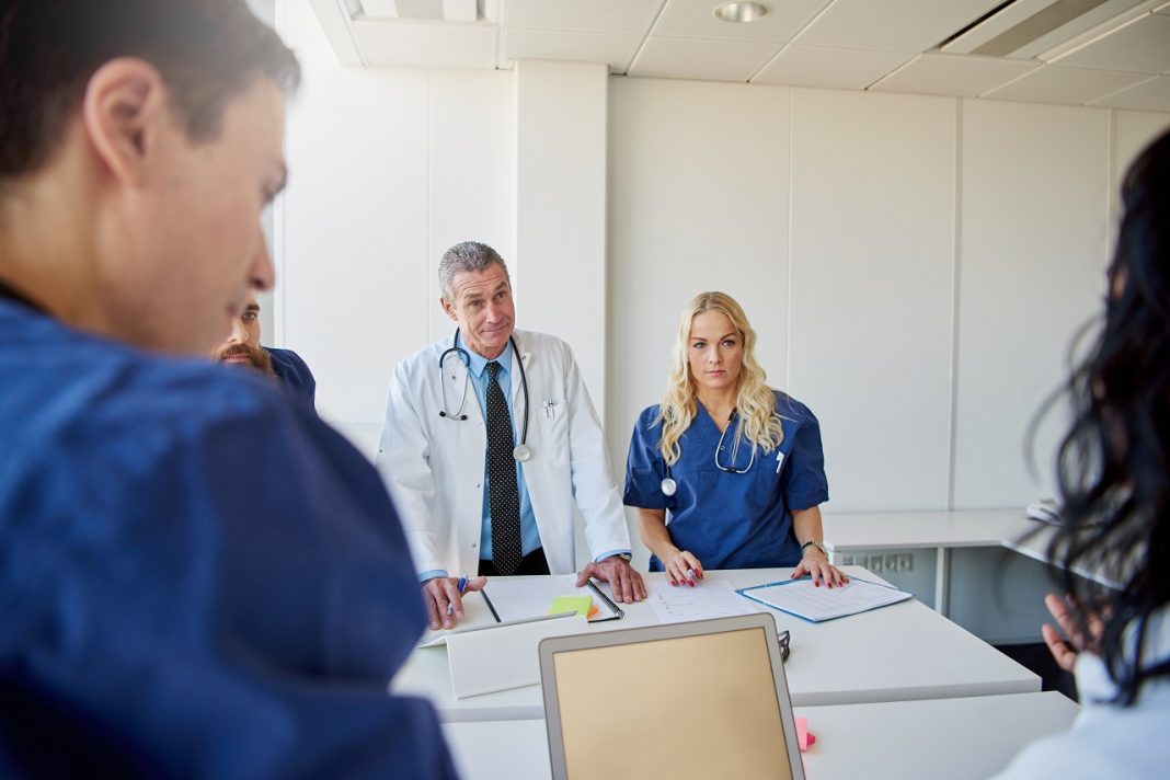 The doctors at the briefing in hospital
