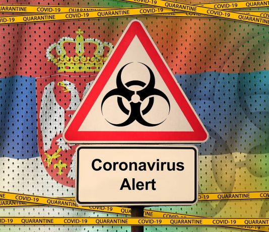 Csehországban a bérek száz százalékára emelik a táppénzt – Szerbiában összeomlástól tartanak Serbia flag and Covid-19 biohazard symbol with quarantine orange tape. Coronavirus or 2019-nCov virus concept