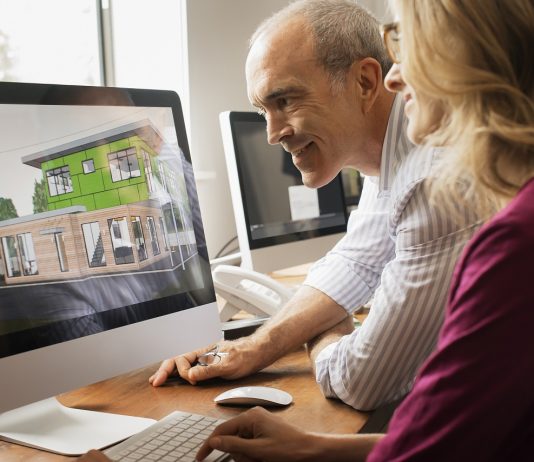 Palkovics: meg kell találni az energiahatékony építési megoldásokat és közlekedési rendszereket Architects at Work on Green Project,USA,Architects discussing a green construction project, designing and building efficient environmentally friendly buildings. Green architectural practice.