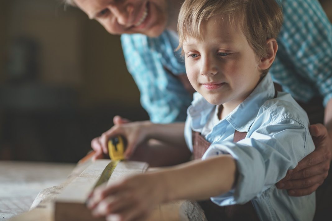 Dad and son in the workshop