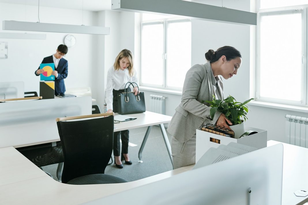 Three young intercultural office managers coming back to their workplaces
