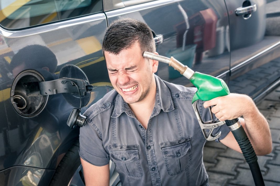 Young adult shooting himself over crazy petrol and fuel prices.