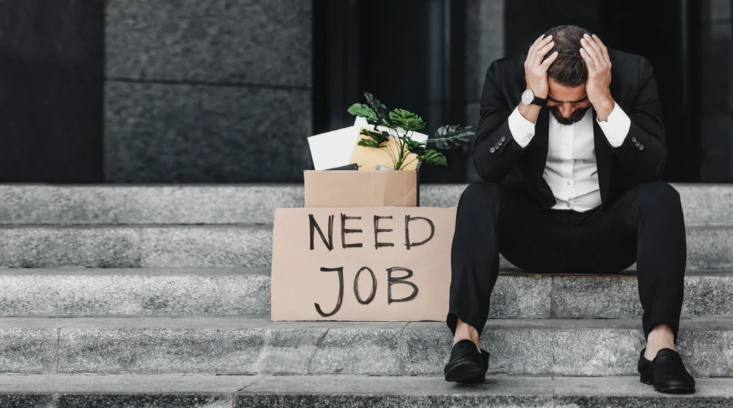 hire-me-on-job-please-depressed-businessman-sitt-2025-03-18-17-23-58-utc-–-nagy